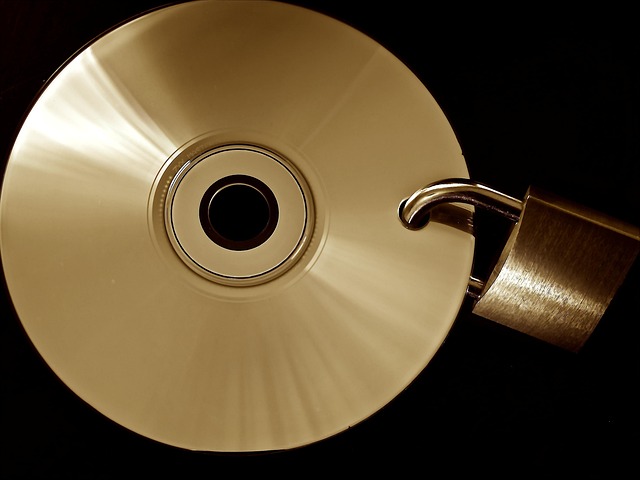 privacy and data protection concept with secure lock and laptop in UK office